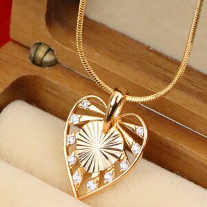 "Radiant Cutout Heart Rose Gold Pendant with Sparkling Accents, XPPT1233